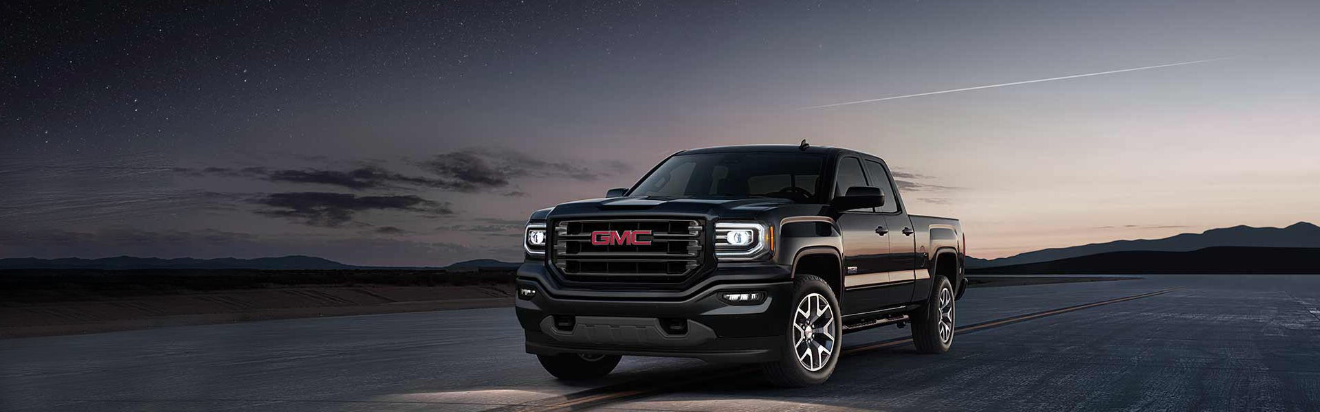 GMC Sierra parked road