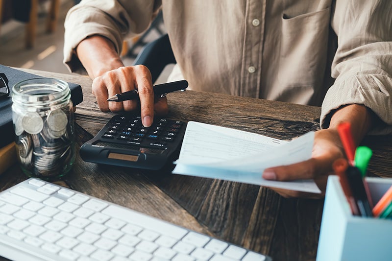 Customer reviewing Buick and GMC financing calculations